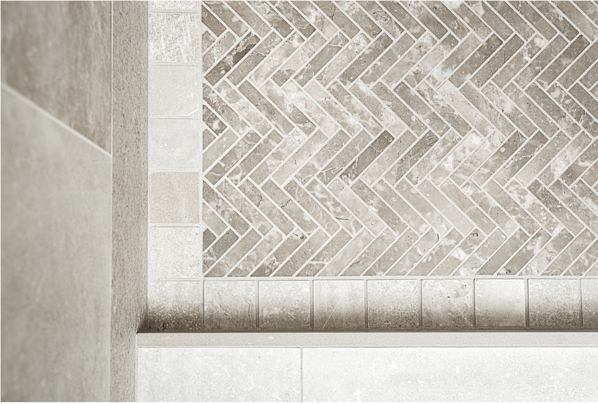 Herringbone tile installation for shower wall in Vancouver WA